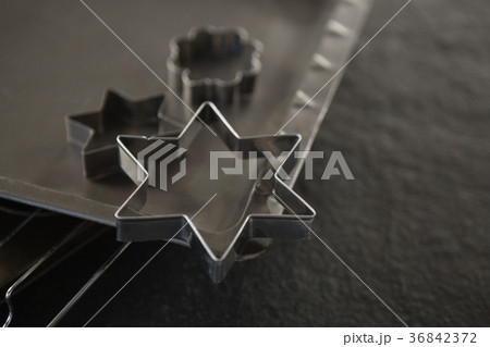 Pastry cutter and baking sheet on cooling rack Pastry cutter and baking sheet on cooling rack 36842372