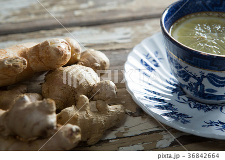 Close up of fresh tea with gingers on table 36842664