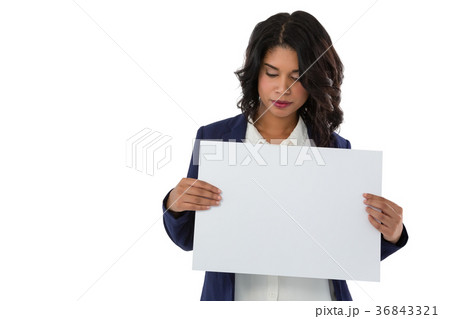 Young businesswoman holding blank white placard 36843321