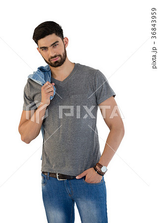 Handsome man posing against white background Handsome man posing against white background 36843959