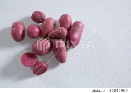 Sweet potatoes on a white background Sweet potatoes on a white background 36843960
