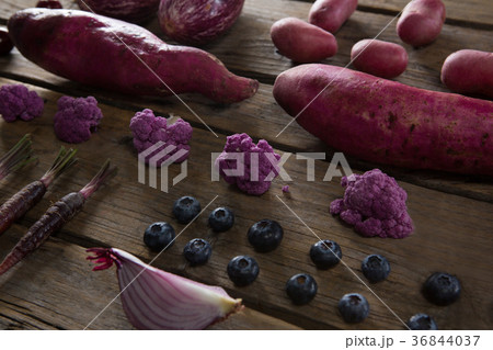 Various vegetable arranged on wooden table Various vegetable arranged on wooden table 36844037
