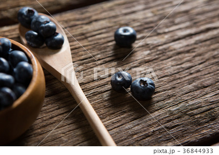 Blueberries on wooden table 36844933