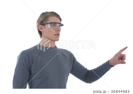 Businessman gesturing while wearing smart glasses 36844983