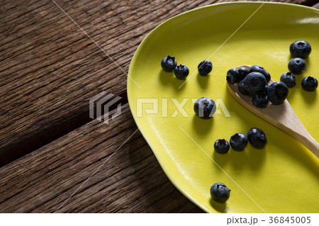 Blueberries in yellow plate Blueberries in yellow plate 36845005