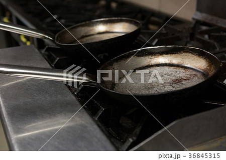 Empty pan on gas stove 36845315