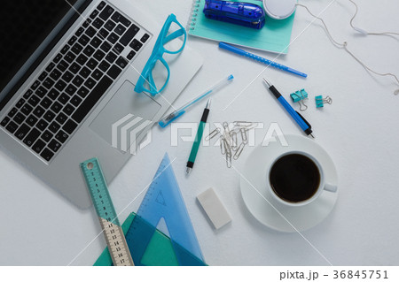 Laptop, black coffee and stationery on white background 36845751