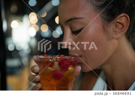 Close-up of beautiful woman having drink Close-up of beautiful woman having drink 36846691