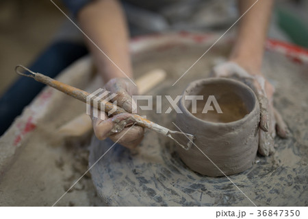 Female potter molding plate with hand tool Female potter molding plate with hand tool 36847350