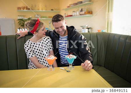 Couple romancing in restaurant 36849151