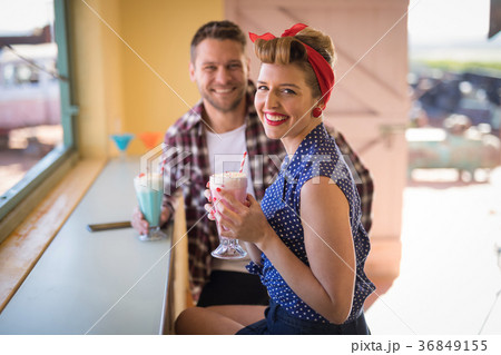 Couple romancing in restaurant 36849155