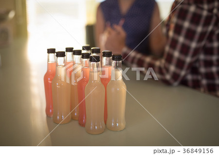 Bottle of soft drinks on table 36849156