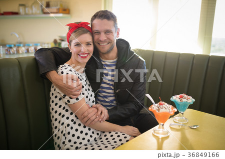 Couple romancing in restaurant 36849166