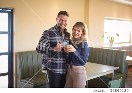Couple having coffee in restaurant 36849189