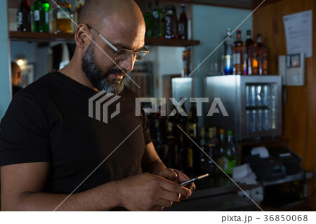Man using mobile phone 36850068