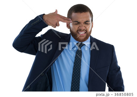 Businessman making gun gesture Businessman making gun gesture 36850805