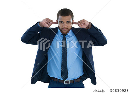 Businessman covering his ears 36850923