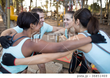 Fit friends forming huddle 36851469