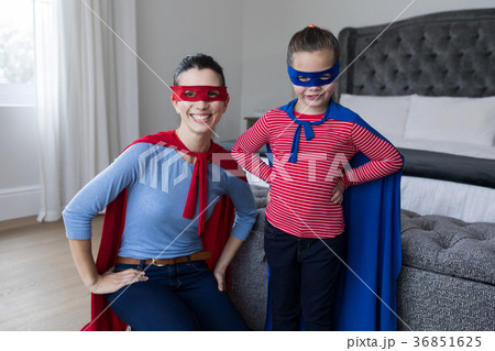 Mother and daughter pretending to be superhero Mother and daughter pretending to be superhero 36851625
