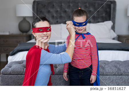 Mother and daughter pretending to be superhero Mother and daughter pretending to be superhero 36851627
