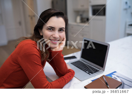 Confident woman working at desk 36851667