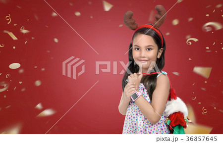 Little girl with christmas background Little girl with christmas background 36857645