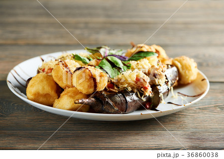 Hot restaurant potato dish with cheese and Hot restaurant potato dish with cheese and 36860038
