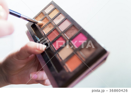 Close up of colorful makeup eye shadow palet Close up of colorful makeup eye shadow palet 36860426