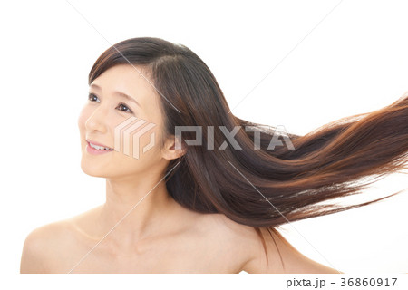 艶やかな髪の女性の写真素材