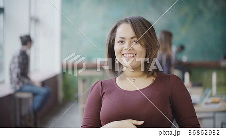 Portrait of young successful female employee Portrait of young successful female employee 36862932