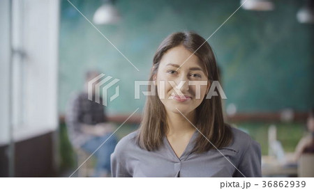 Portrait of beautiful Asian woman in modern office 36862939