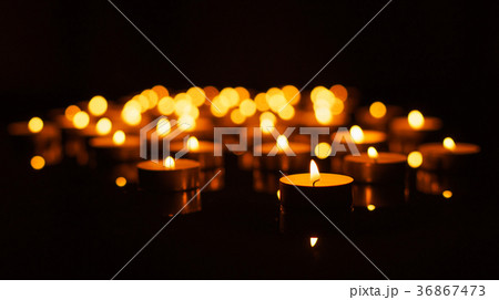 Burning candles with shallow depth of field 36867473