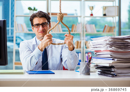 Unhappy businessman thinking of hanging himself in Unhappy businessman thinking of hanging himself in 36869745