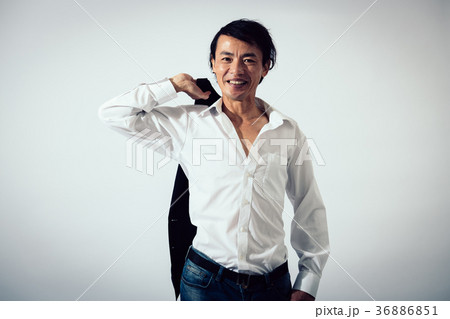 笑顔のミドル男性 ワイルド ちょいワルの写真素材