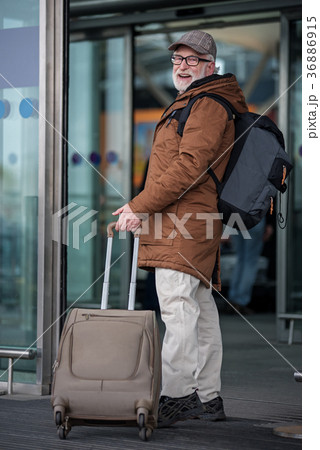Optimistic old male is going to travel Optimistic old male is going to travel 36886915