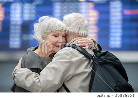 Positive aged couple are embracing with fondness Positive aged couple are embracing with fondness 36886951