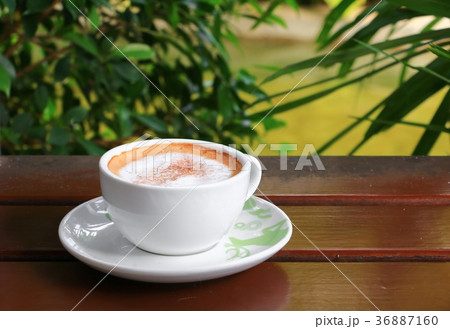 coffee cappuccino on the wood floor background coffee cappuccino on the wood floor background 36887160