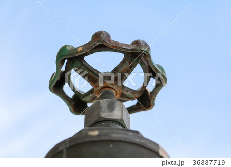 Close up water valve plumbing steel that is rust  36887719