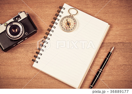 vintage compass on book note and fountain pen vintage compass on book note and fountain pen 36889177