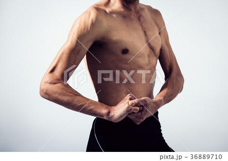 筋肉 シニア男性 アスリート 細マッチョの写真素材