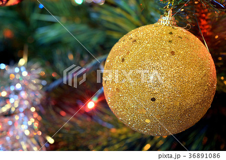 christmas balls on tree with lights and stars 36891086