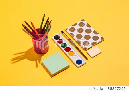 Artistic tools - brushes,  paint, notebook 36897202