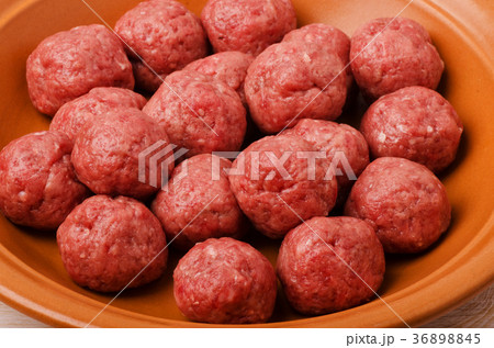 Raw meatballs in plate Raw meatballs in plate 36898845