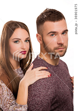 Studio portrait of young beautiful couple in love 36901975