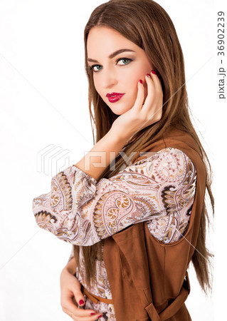 Beautiful girl in casual style: dress and leather 36902239