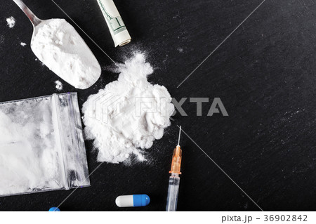 drugs are scattered on the table drugs are scattered on the table 36902842