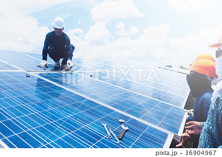 engineer team working on replacement solar panel 36904967