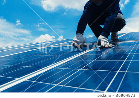 engineer team working on replacement solar panel 36904973