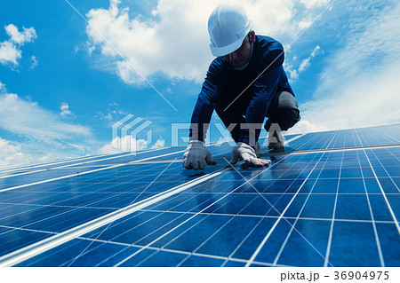 engineer team working on replacement solar panel 36904975