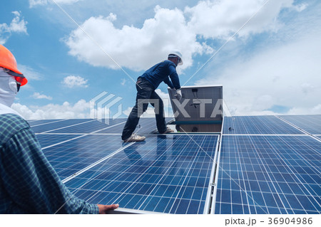 engineer team working on replacement solar panel engineer team working on replacement solar panel 36904986